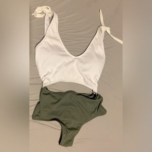 One piece, high waist swim suit. Never worn.
